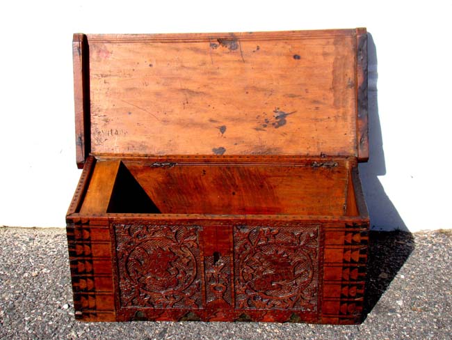 A rare 17th century cedarwood box with carved lions, possibly Italian, circa 1600-1650